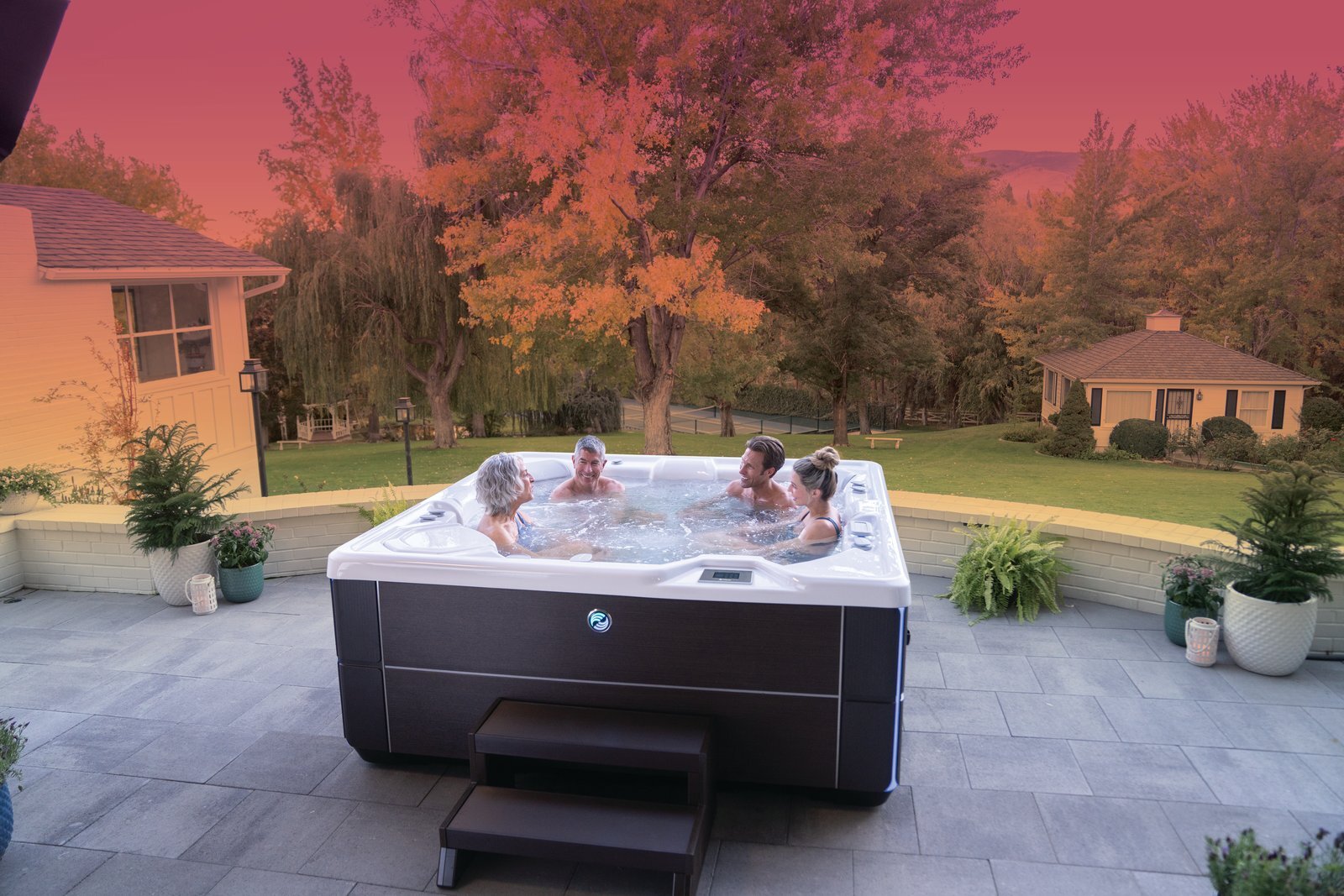 Family relaxing in a Hot Spring hot tub